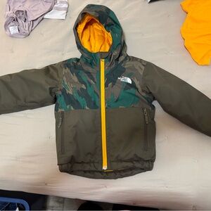 The North Face Green and Yellow Camouflage puffer jacket